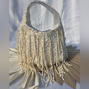 VIRAL CREAM MINI HANDMADE FRINGE HOBO BAG, NWT